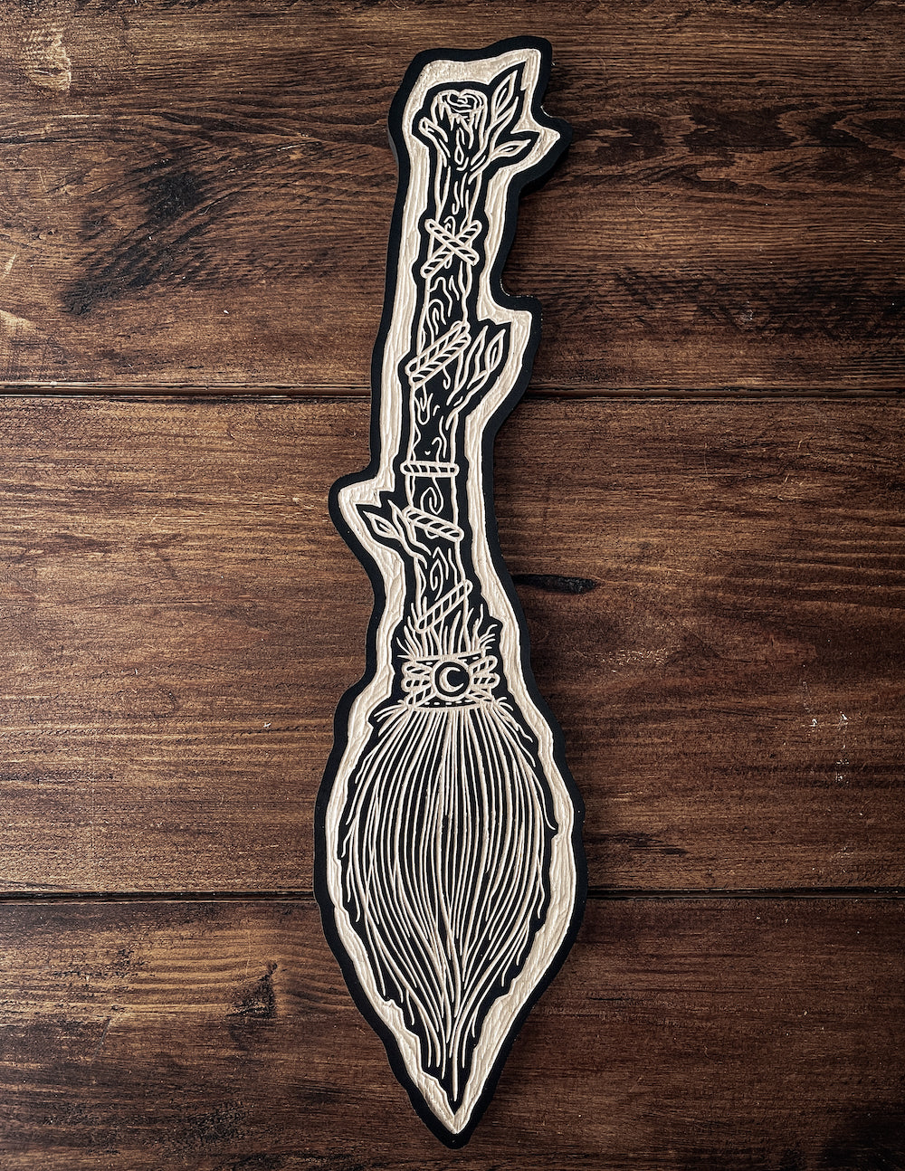Moon broom woodcut
